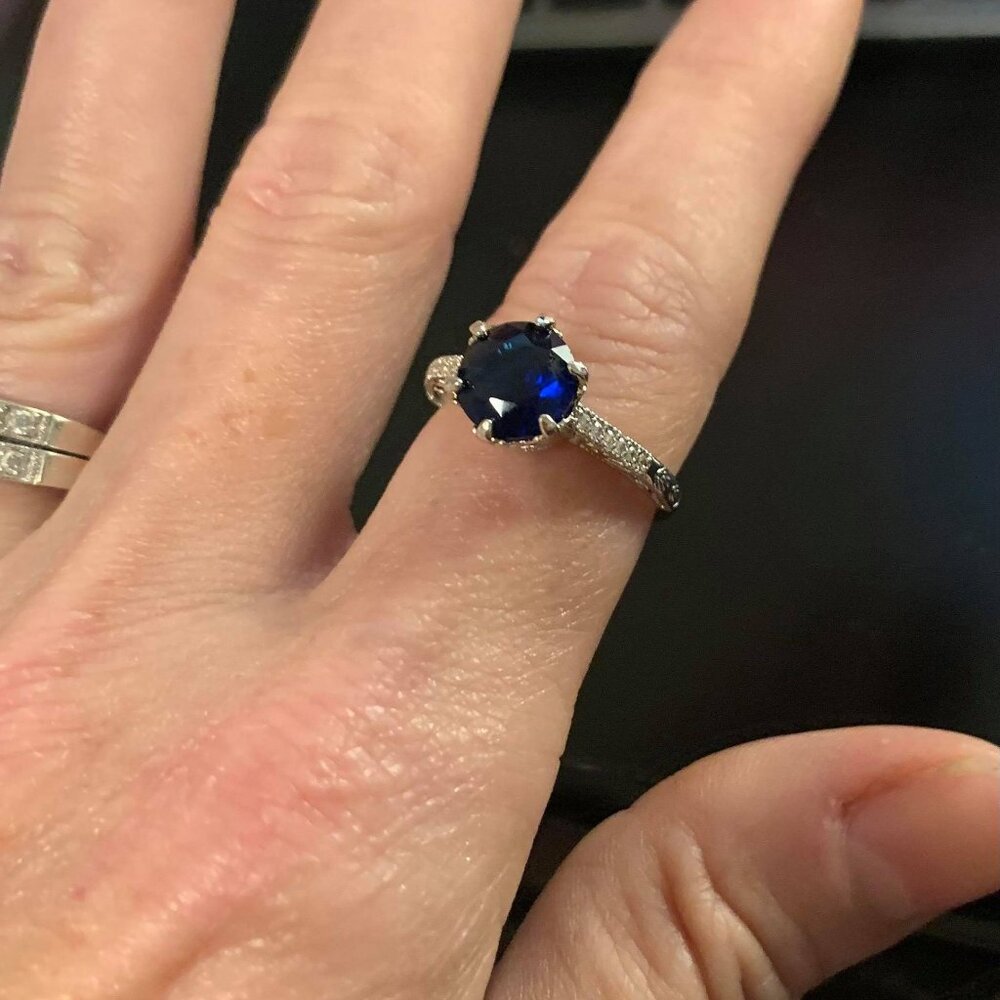 Blue Cubic Zirconia Round Cut Ring on a Beautiful Sterling Silver Setting